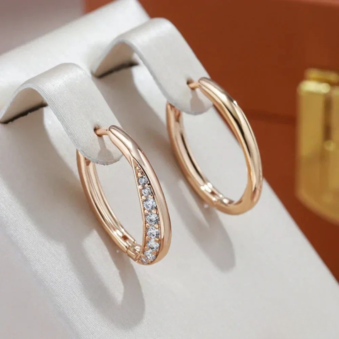 Pendientes elegantes de oro