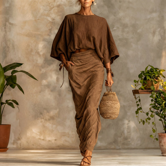 Conjunto elegante de top manga murciélago y falda larga